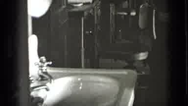 New York USA (1939): Woman Smiling At Camera While Washing Her Hands At Workplace