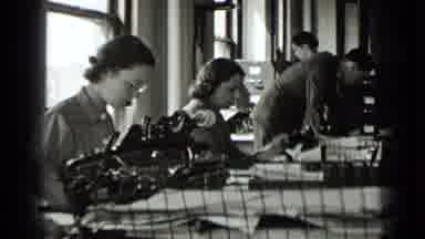 New York USA (1939): Women Working Away At Typewriter While Boss Supervises