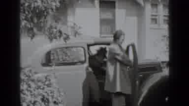 New York USA (1939): Couple Walking Out Of A Car And Then Standing In Front Of The
