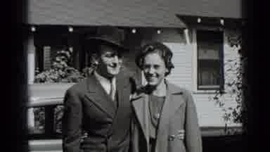 New York USA (1939): Loving Couple Smiling And Posing For A Photograph Wearing