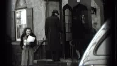 New York USA (1939): A Group Of Men And Women In Formal Attire And All Hats Walk