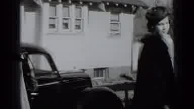 New York USA (1939): Two Women Step Away From A Car And The Woman Slams The Door