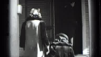 New York USA (1939): Two Woman Walk Up Stairs The One On The Right Limps And A