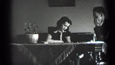 New York USA-1939: Man And Woman Sitting At A Table