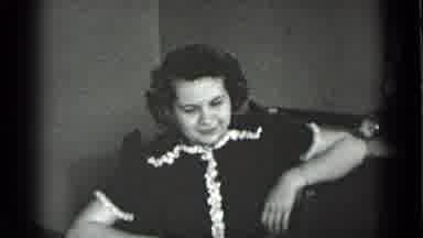 New York USA (1939): Woman Talking To Friend In The Wing Of Her House On Winter