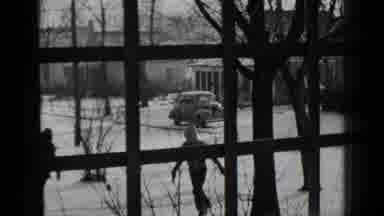 New York USA (1939): Two People Ice Skating As They Are Filmed From Inside Through
