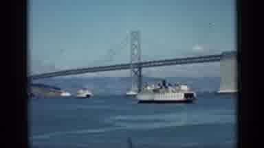 San Francisco California (1939): White Boat Passes By San Francisco Bay Bridge On
