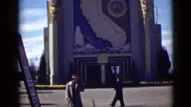 San Francisco California (1939): Camera Overlooks People Walking By A Large