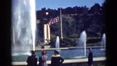 San Francisco California (1939): American Flag Blows In The Wind Next To A Large