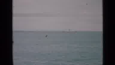 San Francisco California (1939): A Boat Sails On The River Near A Bridge