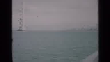 San Francisco California (1939): View Of A Large Bridge From The Water Below While