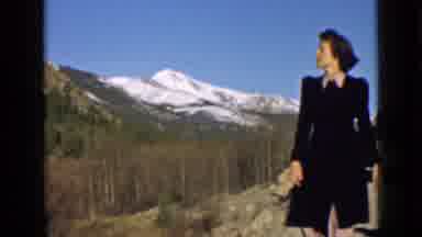 Utah USA (1939): Smiling Lady Steps Off Camera After Looking At Far Away Mountains