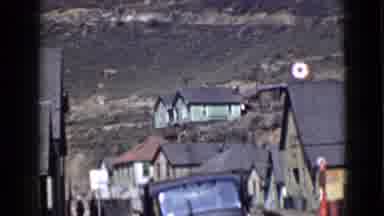 Utah USA (1939): View Of Greenhouse Sitting At Bottom Of Green Hill On A Sunny Day