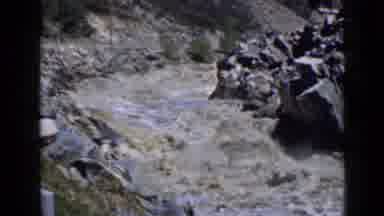 Utah USA (1939): View Of A Muddy Rushing River Near A Very Rocky Area Out In The
