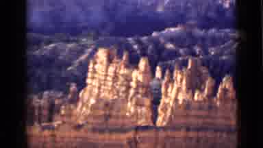 Utah USA (1939): A Valley Of Rock Mountains And Trees And Green Vegetation Around
