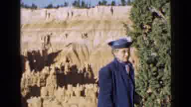Utah USA (1939): A Woman In Blue Dress And Hat Waves ON The Camera And Poses In