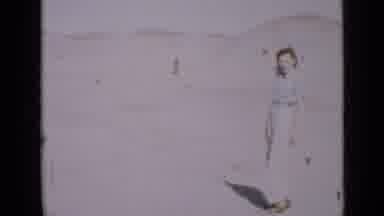 Utah USA (1939): Woman Turning From Camera Man To Point At Another Person