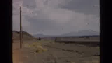 Utah USA (1939): Panning Desert Scenes Hills Mountains Grainy Film Sand Pale Sky