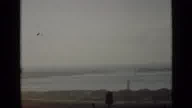 Ontario Canada (1940): Distant View Of A Roadway Near An Expansive Coast With A