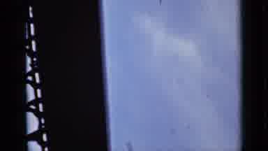 Ontario Canada (1940): Camera Films Blue Sky With Thin Clouds While Looking Past A