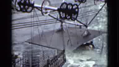 Ontario Canada (1940): Several People Take A Lift From One Side Of A Massive River