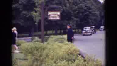 Ontario Canada (1940): Traffic Guard Helping Pedestrians Be Safe In A Tourist