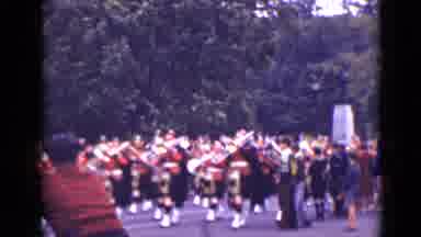 Ontario Canada (1940): Marching Parade Kilt Horn Instruments Men Crowd Red Black