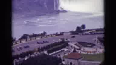 Ontario Canada (1940): A Few Vehicles Carrying A Group Of People Pass By On A Road