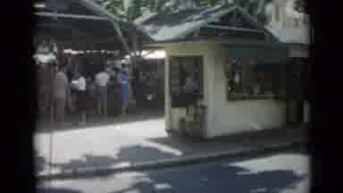 Cannes France (1962): Brown And White Car Passes By Green And White Hut On A Sunny
