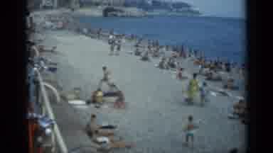 Cannes France (1962): A View Overlooking A Very Crowded Beach Full Of People