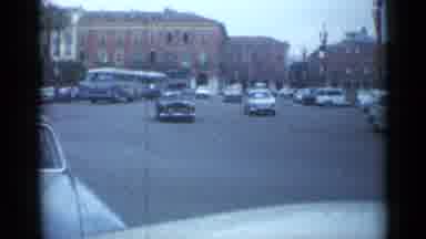 Cannes France (1962): Cars In A Roundabout With Some Cars Changing Lanes And Other