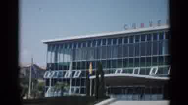 Cannes France (1962): Buildings And A Flag Is Being Hosted With Cars On Road