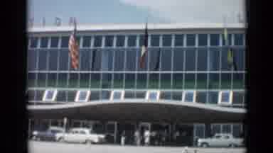 Cannes France (1962): Cars Drop People Off Outside The Entrance Of The Lions