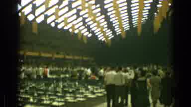 Cannes France (1962): A Large Building Possibly A Gymnasium Decorated With People