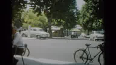 Cannes France (1962): Woman Sitting On A Outdoor Restaurant Next To A Busy Traffic