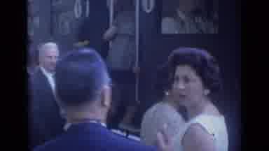 Cannes France (1962): Well Dressed People Walking Into A Train Station And Getting