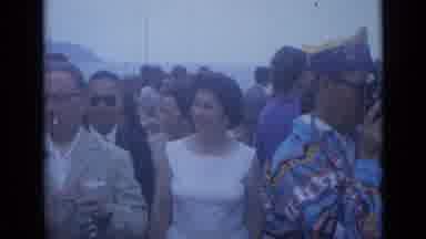 Cannes France (1962): Crowded Foggy Area Full Of Many Colorfully Dressed Men Women