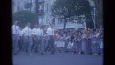 Cannes France (1962): Men In White Shirts And Narrow Ties March Five Abreast In