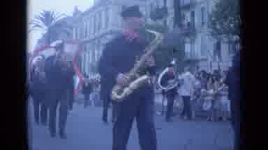 Cannes France (1962): Men Walking Parade Playing Brass Instruments Crowd Watching