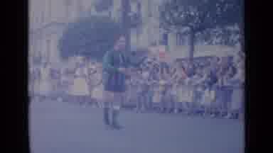Cannes France-1962: Man Kicking Soccer Ball During Parade With Crowd