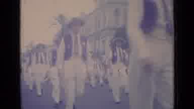 Cannes France (1962): Street Parade At A Tropical Location Shows A Group Of Men