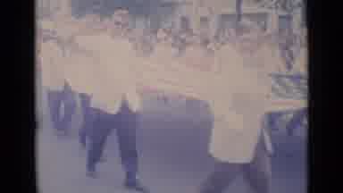 Cannes France (1962): A Dozen Or So Older Men Carry One Large American Flag