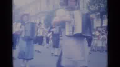 Cannes France (1962): Band Wearing Black And Green Marches In Parade On A Clear