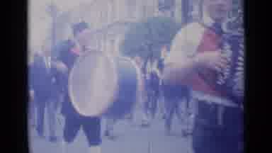 Cannes France (1962): Bands Marching The The Street Through A Town Playing
