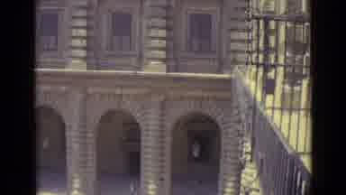 Florence Italy (1962): View Of A Brick Building With Windows On A Sunny Day