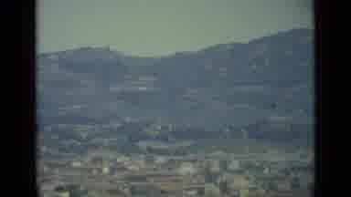 Florence Italy (1962): A Hazy View Of The Mountains And The City Nestled Under