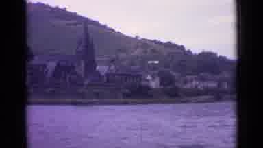 Germany (1962): St Goar Pier With A Man Tie A Rope And A Village Next To A Lake