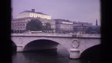 Germany (1962): A Stone Bridge In A European City With A Lots Of People Crossing