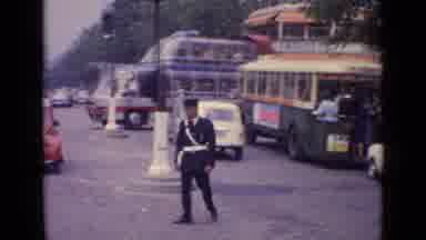 Germany (1962): A Very Large Two-Decker Bus Traveling On A City Street