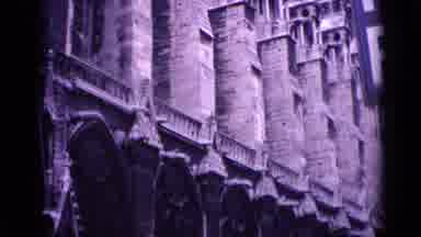 Germany (1962): A Steeple And The Side Of A Building With Intricate Architecture